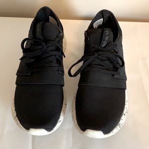 Adidas Originals black tubular sneakers with speckled sole